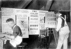 Workers creating signs in the 1920's